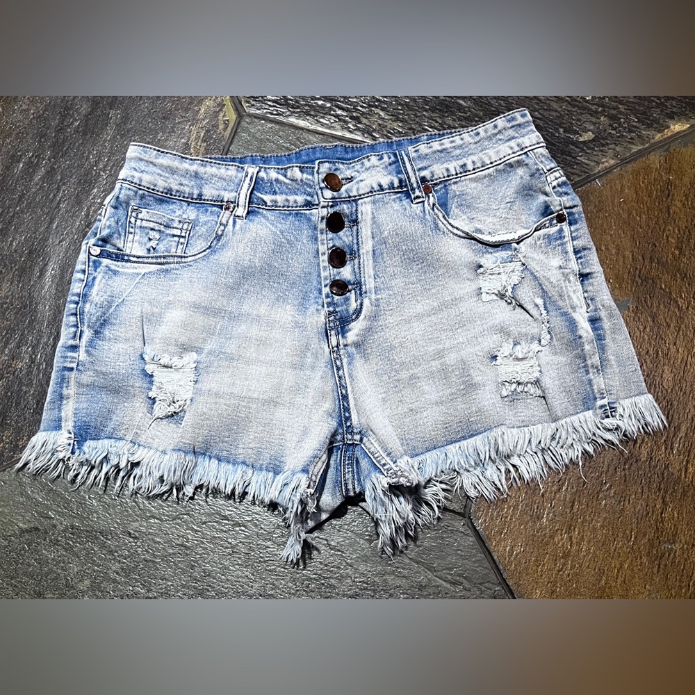 Short shorts.  Worn denim Size Large.  Stretchy.  3” inseam. Preowned. Buttonfly